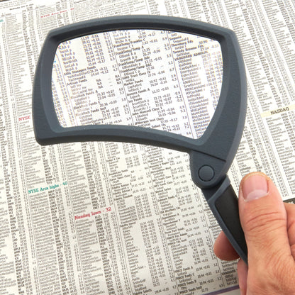 Carson Optical Lighted Magnifold magnifier in use