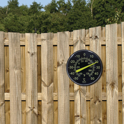 TR608 12" / 30 cm Neon Dial Weather Thermometer on fence